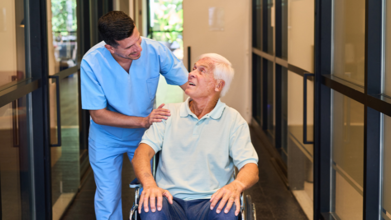 Jano Med-Ride driver assisting a patient at the vehicle entrance during a medical escort pickup in South Florida