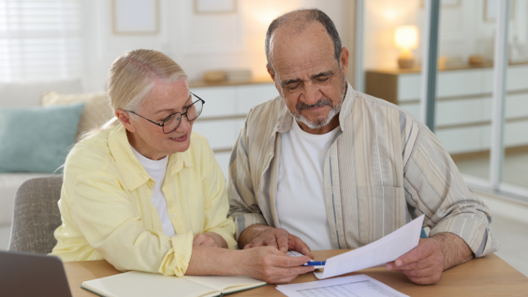Family reviewing non-emergency medical transportation cost options and pricing at home