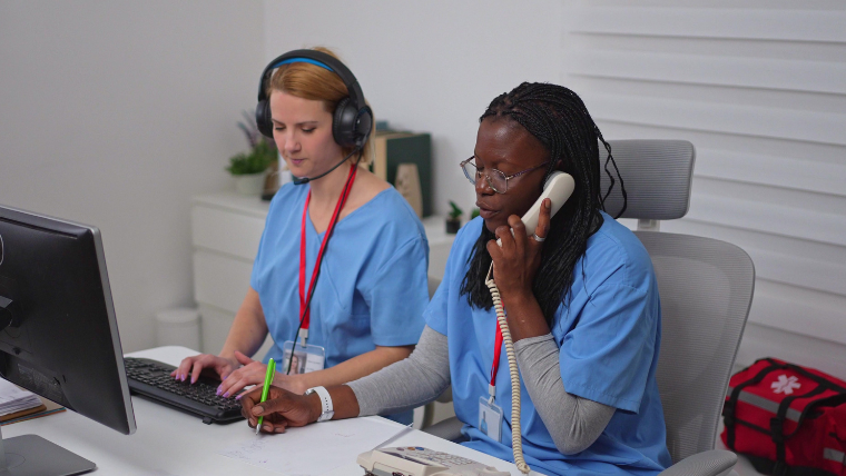 Jano Med-Ride dispatcher taking a same-day booking call for a South Florida patient